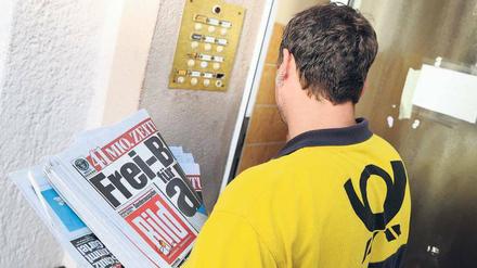 „Bild“-Träger. Postboten und Zusteller verteilten 41 Millionen Exemplare. Foto: dpa