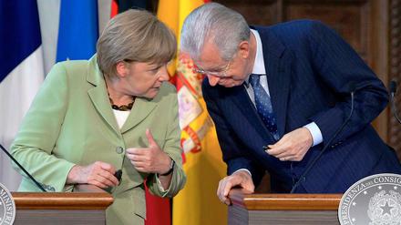 Angela Merkel und Mario Monti haben sich am Freitag mit den Regierungschefs Frankreichs und Spaniens getroffen, um über Lösungsansätze der Schuldenkrise zu sprechen.