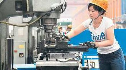 Viel zu tun: China wächst – zumindest beim Export. Insgesamt aber hat sich das Wirtschaftswachstum des Landes abgeschwächt. Die Regierung steuert dagegen. Foto: AFP