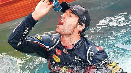 ... verleiht Flossen? Mark Webber hätte da eine Anregung, was den Werbeslogan seines auf Getränkedosen spezialisierten Arbeitgebers betrifft. Foto: dpa