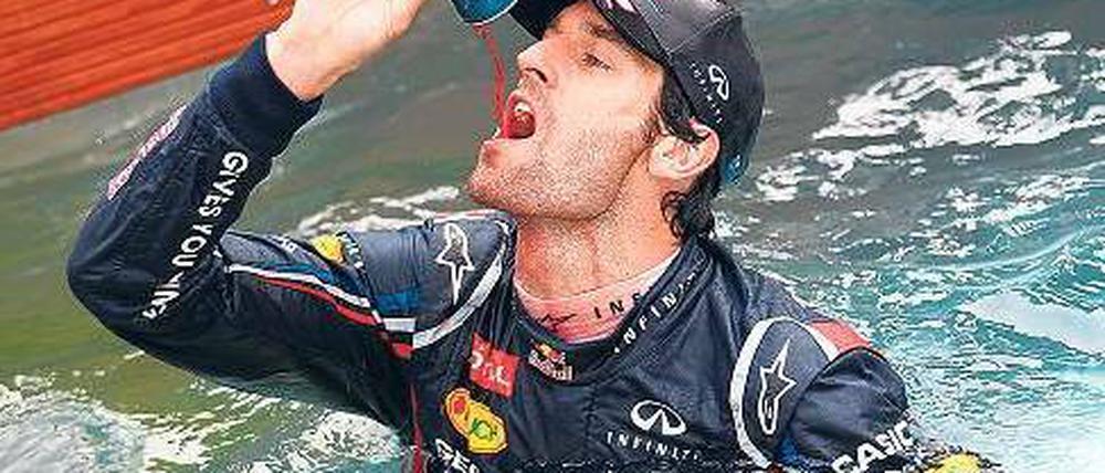 ... verleiht Flossen? Mark Webber hätte da eine Anregung, was den Werbeslogan seines auf Getränkedosen spezialisierten Arbeitgebers betrifft. Foto: dpa