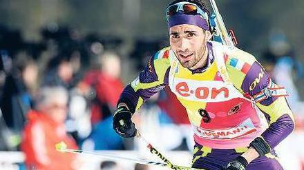 Zum Sieg gesprintet. Der Franzose Martin Fourcade gewinnt die Entscheidung über zehn Kilometer bei der WM. Foto: AFP
