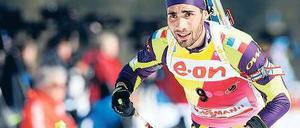 Zum Sieg gesprintet. Der Franzose Martin Fourcade gewinnt die Entscheidung über zehn Kilometer bei der WM. Foto: AFP