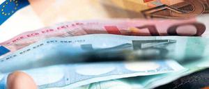 Mehr im Portemonnaie. Viele Dax-Konzerne belohnen die Beschäftigten. Foto: dapd