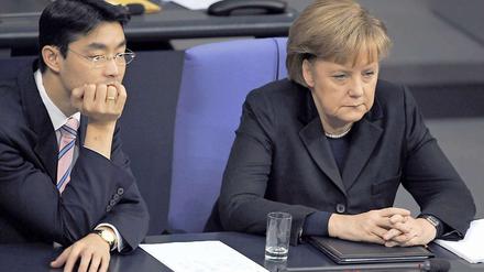 Dicke Luft: Philip Rösler und Angela Merkel. 
