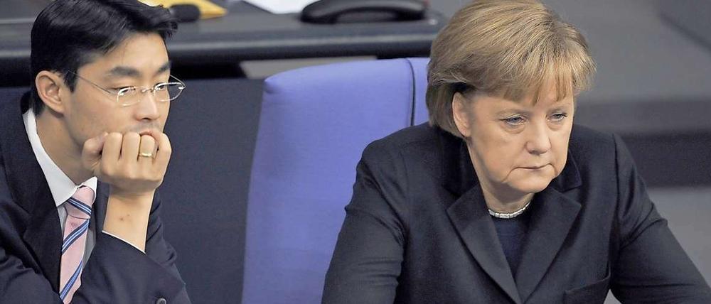 Dicke Luft: Philip Rösler und Angela Merkel. 