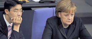 Dicke Luft: Philip Rösler und Angela Merkel. 