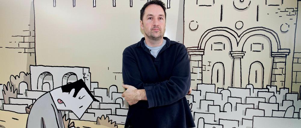 Guy Delisle und sein Alter Ego: Der Gewinner vor dem Covermotiv seines aktuellen Buches.