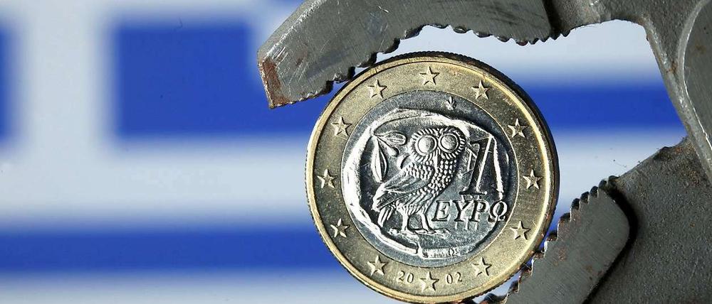 Griechenland in der Klemme: Im März droht die Zahlungsunfähigkeit. Der Verhandlungen um einen Schuldenschnitt mit den privaten Gläubigern kommen indessen nicht voran.