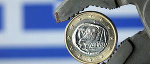 Griechenland in der Klemme: Im März droht die Zahlungsunfähigkeit. Der Verhandlungen um einen Schuldenschnitt mit den privaten Gläubigern kommen indessen nicht voran.