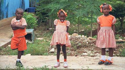 Zu Späßen aufgelegt. Diese Kinder gehen zwei Jahre nach dem Beben in Port-au-Prince wieder zur Schule.