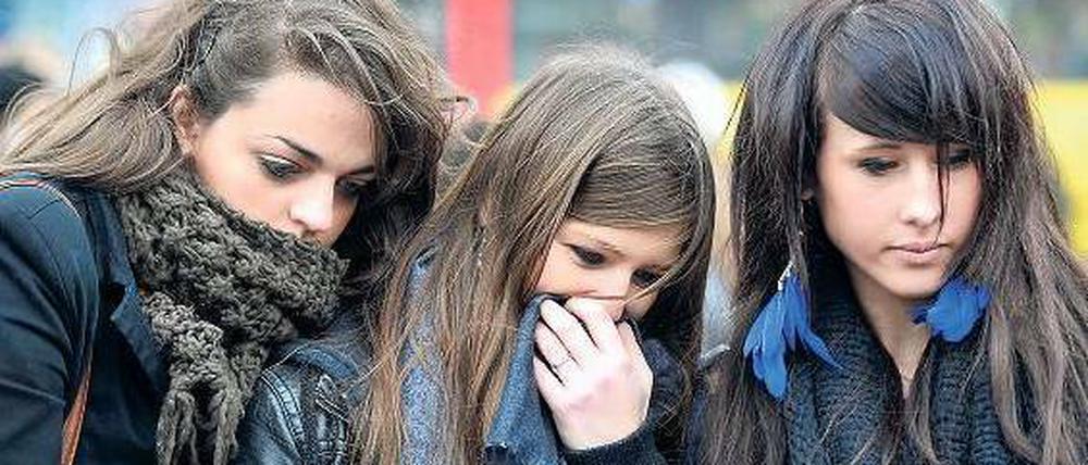 Belgische Tragödie. Im Zentrum von Lüttich gedachten Menschen der Opfer der Tat. Foto: dpa