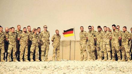 Noch einmal lächeln. Knapp 1000 Isaf-Soldaten treten in den kommenden Wochen den Rückzug aus Afghanistan an.