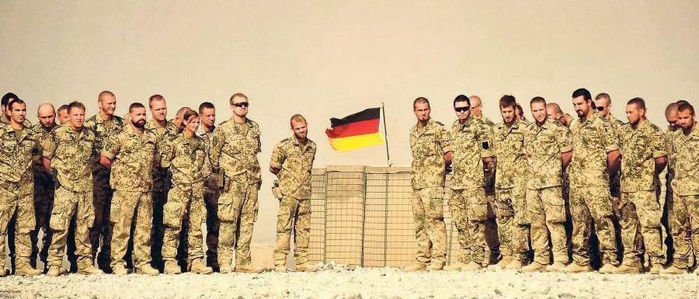 Noch einmal lächeln. Knapp 1000 Isaf-Soldaten treten in den kommenden Wochen den Rückzug aus Afghanistan an.