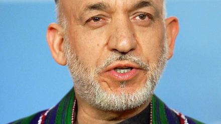 Der afghanische Präsident Hamid Karsai ist offiziell Vorsitzender der Tagung. Dabei soll er selbst das Treffen eher als "Bedrohung" ansehen...