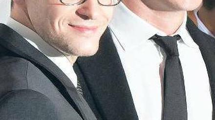 Doppelbegabung. Justin Timberlake (li., mit Kollege Arnie Hammer bei der „Social Network“-Premiere in New York) ist als Sänger wie als Schauspieler erfolgreich. Foto: AFP