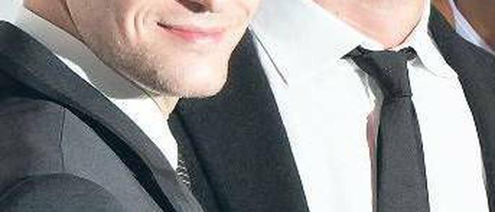 Doppelbegabung. Justin Timberlake (li., mit Kollege Arnie Hammer bei der „Social Network“-Premiere in New York) ist als Sänger wie als Schauspieler erfolgreich. Foto: AFP