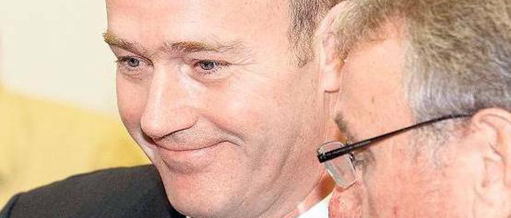 Sonnenschein. So nennt der lächelnde Angeklagte Gerhard Gribkowsky eine Privatstiftung, in die hohe Millionenbeträge eingezahlt worden sind. Foto: dpa