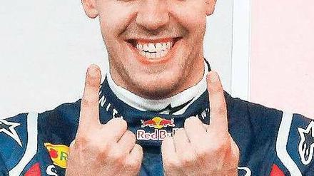 Eins und eins macht zwei. Vettel hat einige Helden seiner Kindheit eingeholt. Foto: dapd