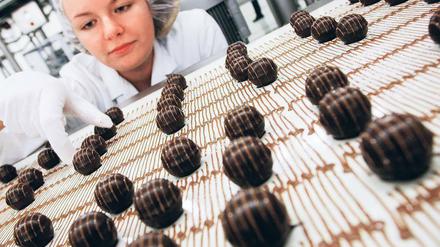 Tradition im Superlativ. Halloren beschreibt sich als die älteste deutsche Schokoladenfabrik. Mit seinen Kugeln hat der Hersteller auch im Westen Erfolg. Seit 2007 ist das Unternehmen an der Fankfurter Börse notiert. Foto: dpa