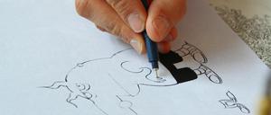 Früh übt sich. Der Berliner Comic-Star Fil - hier bei der Arbeit an einem Didi&amp;Stulle-Comic - zeichnet seit seiner Jugend.