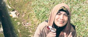 Auf Protest folgt Haft: Eine Anhängerin der Oppositionsbewegung „Bersih“ nach ihrer Festnahme in Malaysias Hauptstadt Kuala Lumpur.