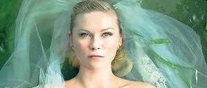 Trance der letzten Tage: Justine (Kirsten Dunst) lässt sich in Lars von Triers Festivalbeitrag "Melancholia" treiben, während ein Planet auf die Erde zurast.