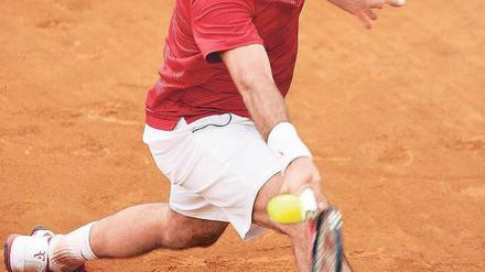 Spuren im Sand. Roger Federer kann heute seinen 17. Grand-Slam-Titel holen. Foto: AFP