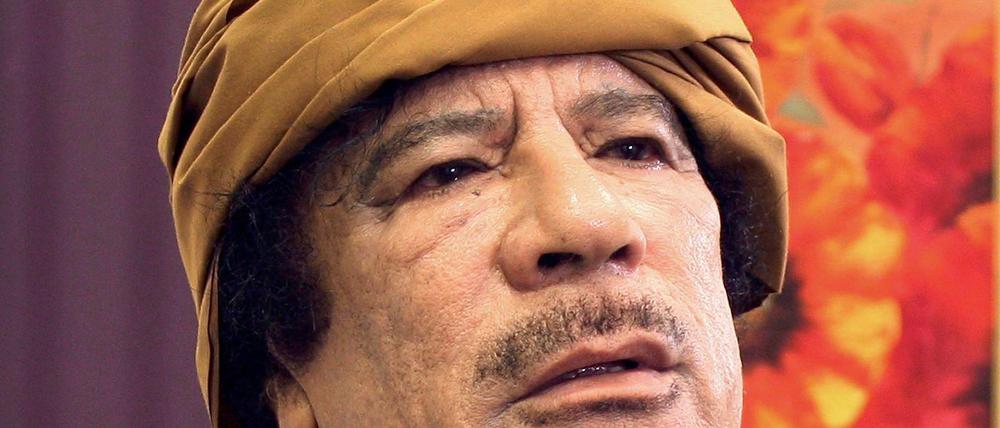 Muammar al Gaddafi.