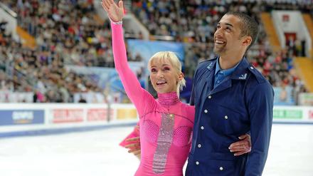 Aljona Savchenko und Robin Szolkowy freuen sich über eine gelungene Kür und den WM-Titel.