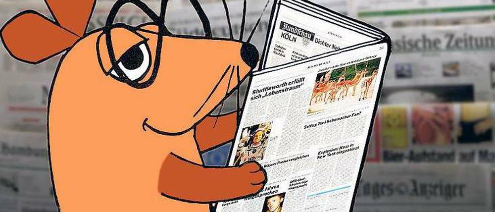 Diese Maus ist schlauer als andere Mäuse. Und weil sie so schlau ist, arbeitet sie zwar fürs Fernsehen, informiert sich aber über die Zeitung. Eine schlaue Maus, gar keine Frage. Foto: WDR