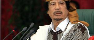 Muammar al Gaddafi.