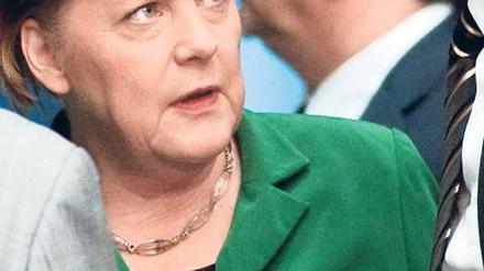 Zu viel exportiert? Angela Merkel erklärt Barack Obama, warum die deutschen Firmen so erfolgreich auf den Weltmärkten sind. Dem US-Präsident gefällt das gar nicht. 