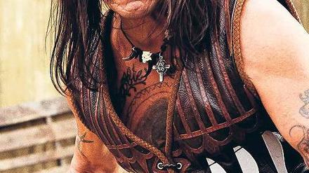 In Action. Machete (Danny Trejo).