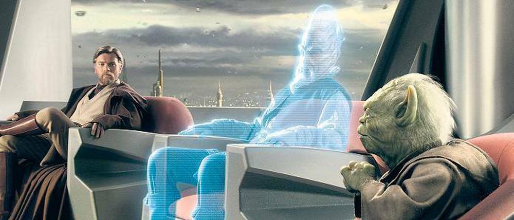 Mittendrin. Dank Holografie kann ein leidlich perfektes Abbild des Körpers an jeden beliebigen Ort transportiert und dort wieder „zusammengesetzt“ werden. Bekannt wurde die visionäre Technik vor allem durch Sciencefiction-Filme, wie hier in „Star Wars: Episode III - Die Rache der Sith“ (USA 2005, Regie: George Lucas).Foto: Lucasfilm/Cinetext Bildarchiv