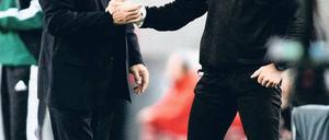 Stabübergabe. Christian Gross (l.) verlässt Stuttgart nach nicht einmal einem Jahr. Sein bisheriger Assistent Jens Keller (r.) trainiert die Schwaben einstweilen interimsmäßig. Foto: dapd