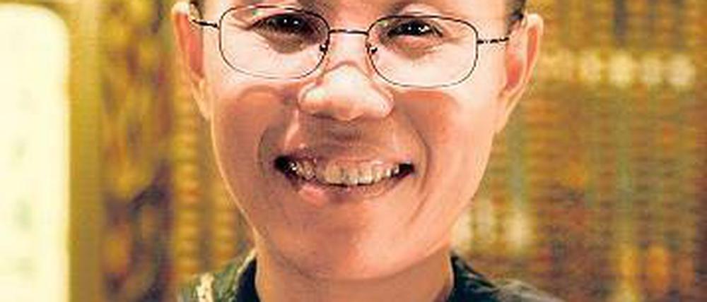 Liu Xia überbrachte ihrem Mann die Nachricht im Gefängnis.