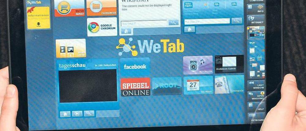 Alternative zum iPad: Der berührungsempfindliche Bildschirm des We-Tab ist mit 11,6 Zoll größer und das Gerät mit 995 Gramm insgesamt schwerer als das iPad von Apple.