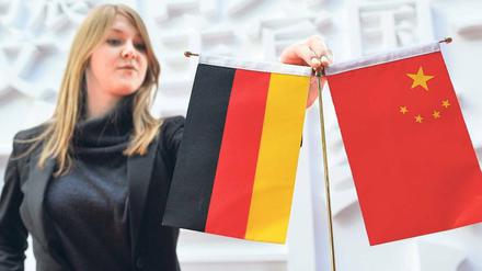 Im Griff. Schon lange engagieren sich deutsche Firmen in Asien – durch das Wachstum der Schwellenländer läuft es nun umgekehrt. Foto: dpa