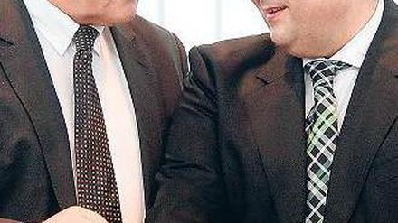 Tragfähiger Kompromiss? Genossen Gabriel (rechts), Steinmeier. Foto: Wolfgang Kumm/dpa