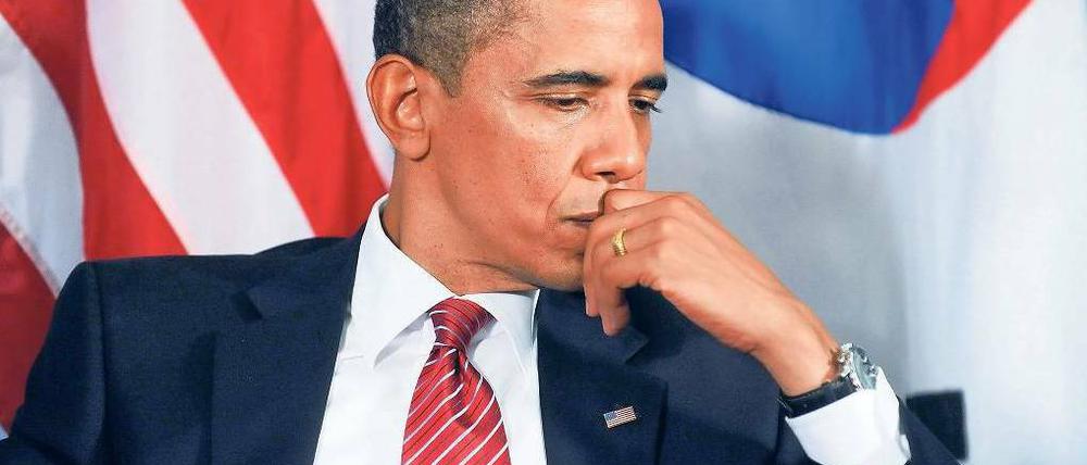 Zeit zum Nachdenken. US-Präsident Barack Obama war auf einer Welle der Euphorie ins Amt gekommen – doch viele Wähler scheinen jetzt enttäuscht. Bei der Kongresswahl im Herbst müssen seine Demokraten mit einer schmerzlichen Niederlage rechnen. Foto: dpa