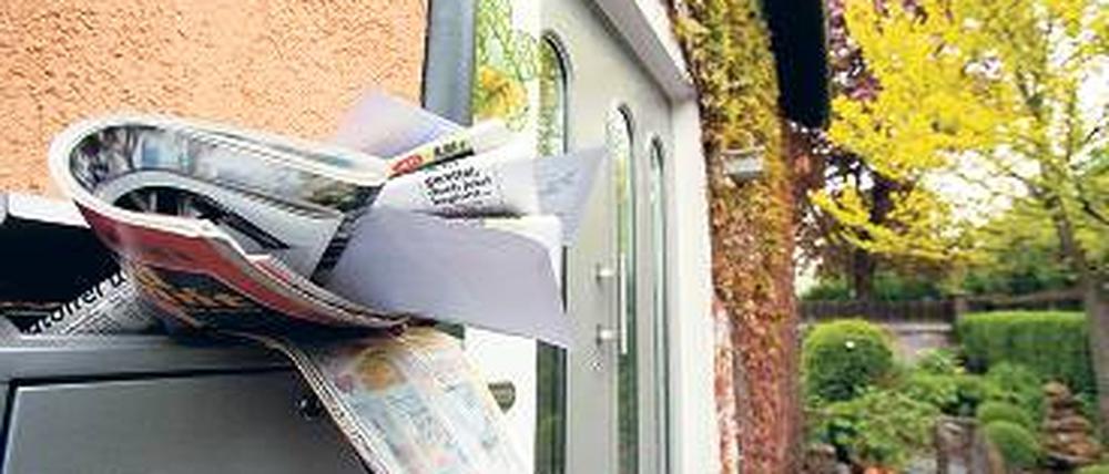 Überquellende Briefkästen sollten in der Urlaubszeit vermieden werden. Foto: dpa