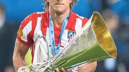 Sonnenkönig. Forlan feierte sich selbst, seinen Klub und seine Heimat. Foto: dpa