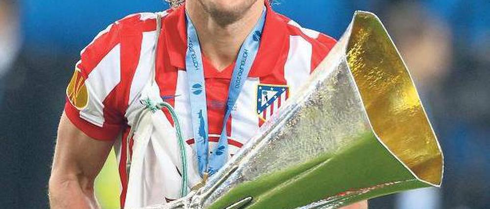 Sonnenkönig. Forlan feierte sich selbst, seinen Klub und seine Heimat. Foto: dpa