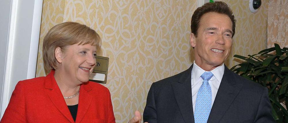 Bundeskanzlerin Angela Merkel trifft den "Terminator" Arnold Schwarzenegger.