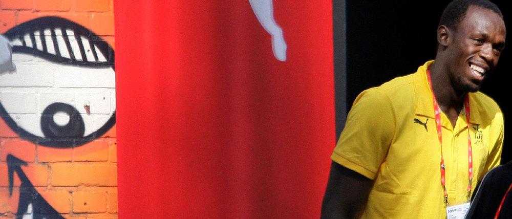 Sprinter Bolt of Jamaica arrives for news conference in Berlin