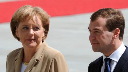 Medwedew und Merkel