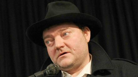 Wiglaf Droste 2011 bei einer Lesung.