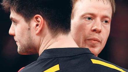 Sieg unter Freunden. Patrick Baum (r.) nach seinem Erfolg gegen Dimitrij Ovtcharov – am Ende nutzte aber auch Baum diese Überraschung nicht, im Viertelfinale schied er aus.