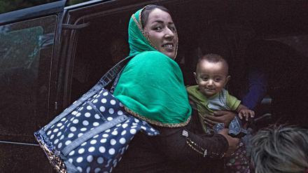 Eine syrische Mutter mit ihrem Baby bei ihrer Ankunft in Deutschland.